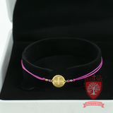 Divine Grace Gold-Plated Cross Bracelet on Purple Cord
